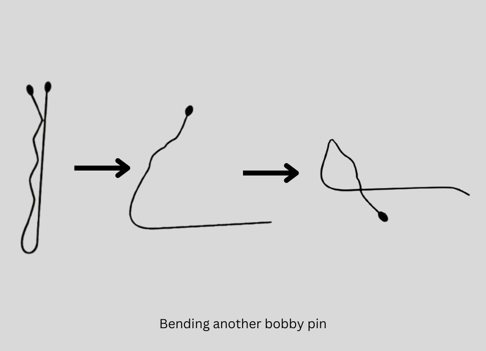 bending bobby pin to unlock a deadbolt lock